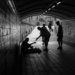 a group of people standing in a tunnel