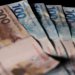 Renda média das famílias brasileiras atinge recorde de R$ 2.264 em 2025