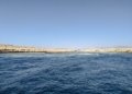a body of water next to the ocean
