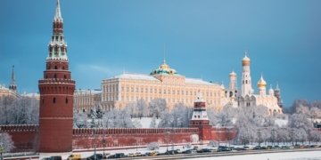Moscow's kremlin stands tall on a snowy winter day.